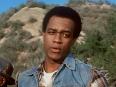 Kevin Peter Hall as Floyd Malone