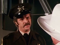 Bill Cross as Armored Truck Driver