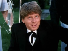 Robert Morse as Dewey Hogg